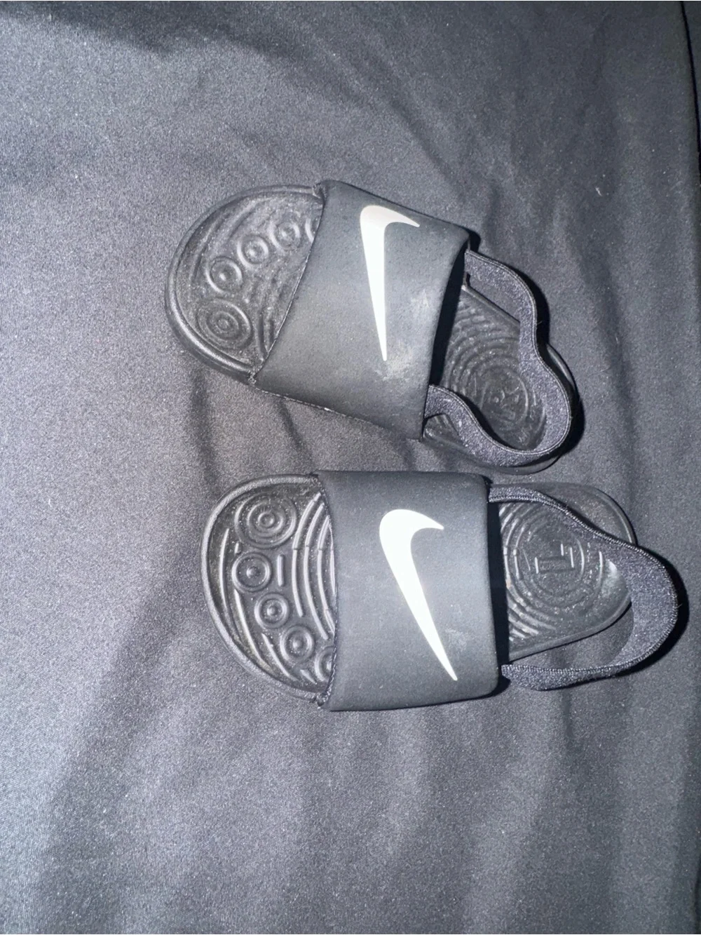 Nike Kids Black Slides with White Swoosh and Back Heel Strap